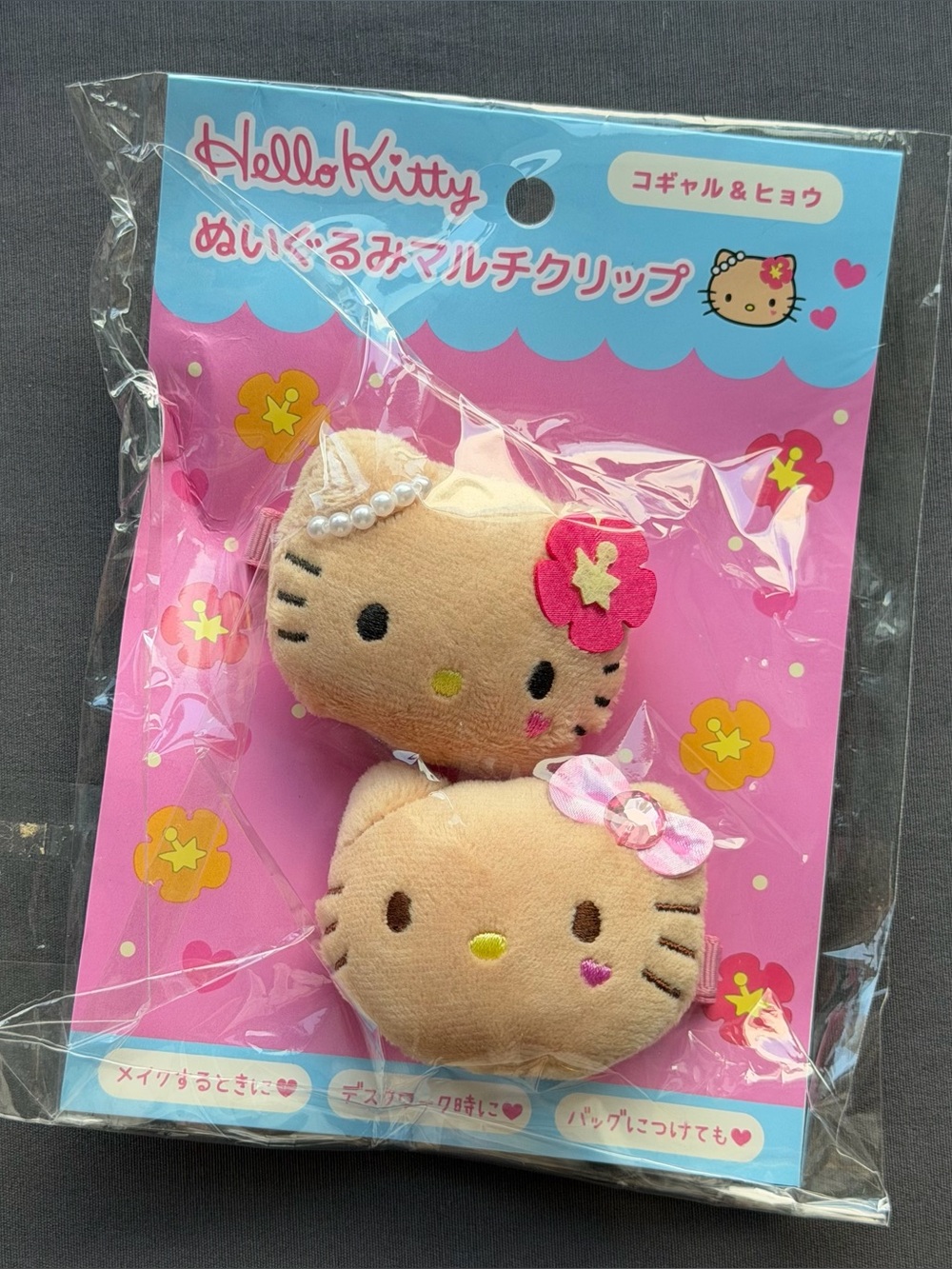 Sanrio Tanned Hello Kitty Hawaii style hair clips(price for one pair)